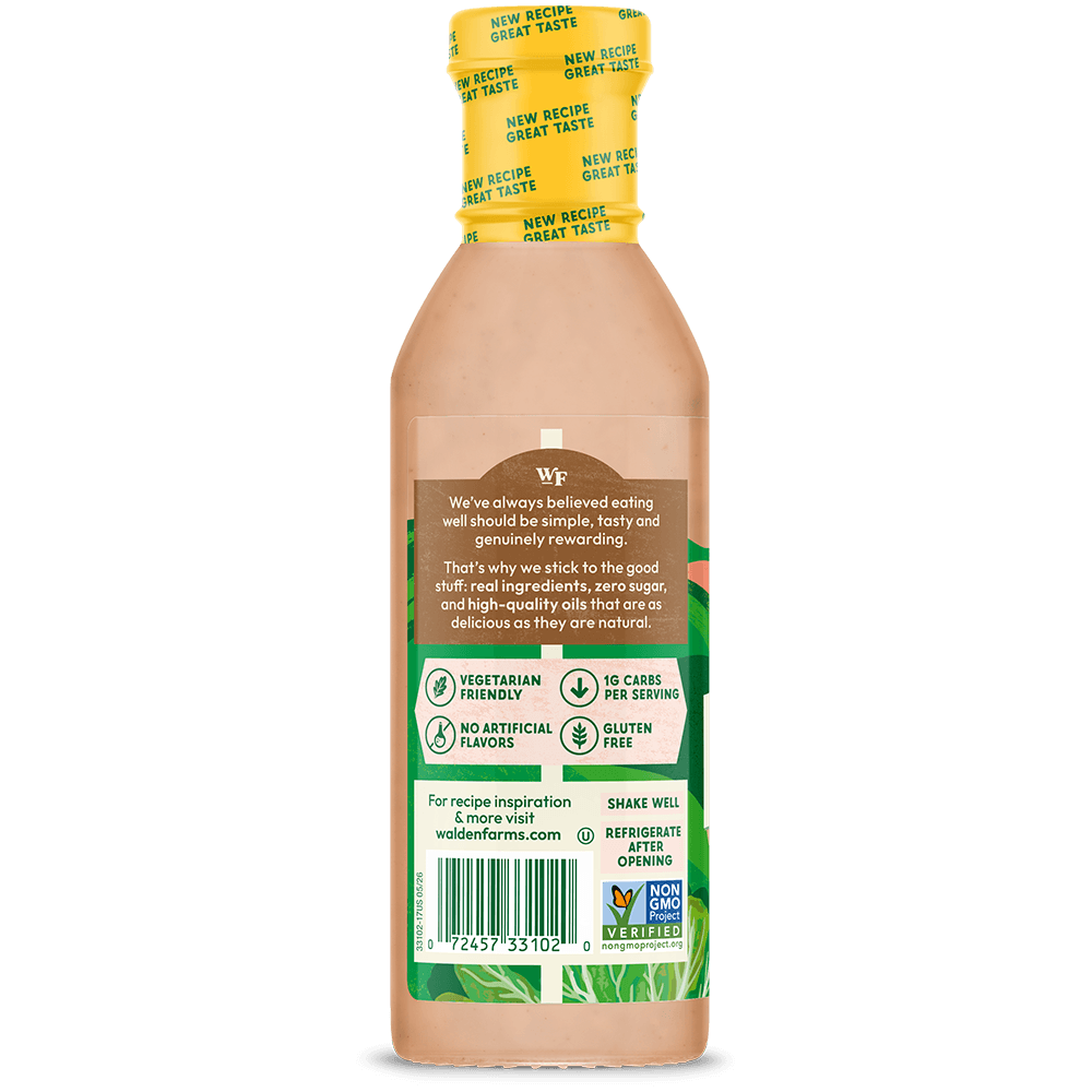 A bottle of waterford Organic Mediterranean Salad Dressing shown from the back, featuring a yellow cap, peach-colored liquid inside, and a detailed brown, green, and white label with a barcode.