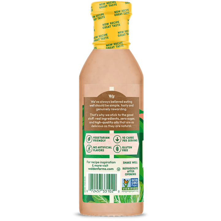 A bottle of waterford Organic Mediterranean Salad Dressing shown from the back, featuring a yellow cap, peach-colored liquid inside, and a detailed brown, green, and white label with a barcode.