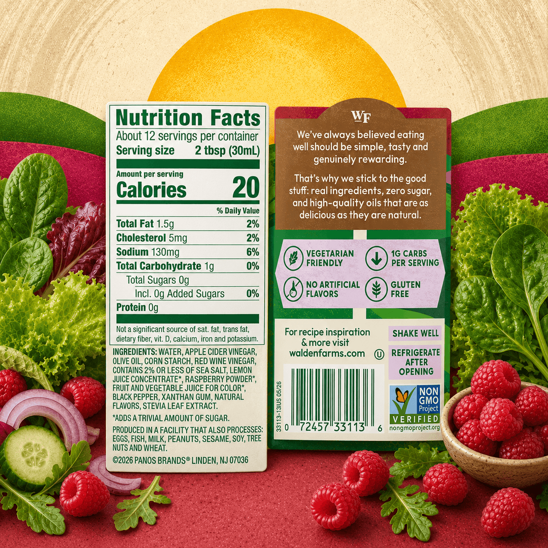 Back label of Walden Farms Raspberry Vinaigrette showing Nutrition Facts, ingredients, barcode, and product information with fresh raspberries and leafy greens.