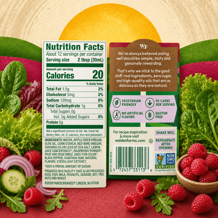 Back label of Walden Farms Raspberry Vinaigrette showing Nutrition Facts, ingredients, barcode, and product information with fresh raspberries and leafy greens.