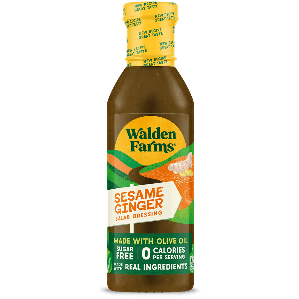 A bottle of Walden Farms Sesame Ginger Salad Dressing on a solid black background. The bottle is filled with a golden-brown dressing and features a yellow cap with a green and white label.